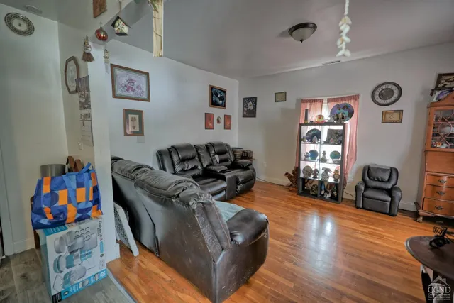 a kitchen that has a sink and a stove in it