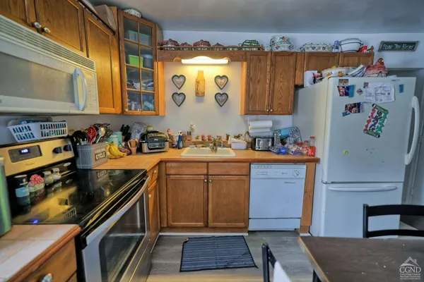 a bedroom with a bed and a table in it