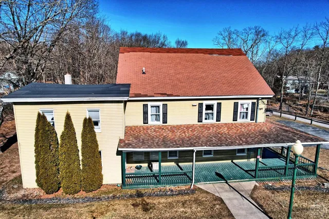 a bathroom with a sink vanity and a mirror