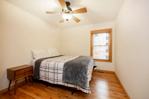 a view of a house with a yard and garage