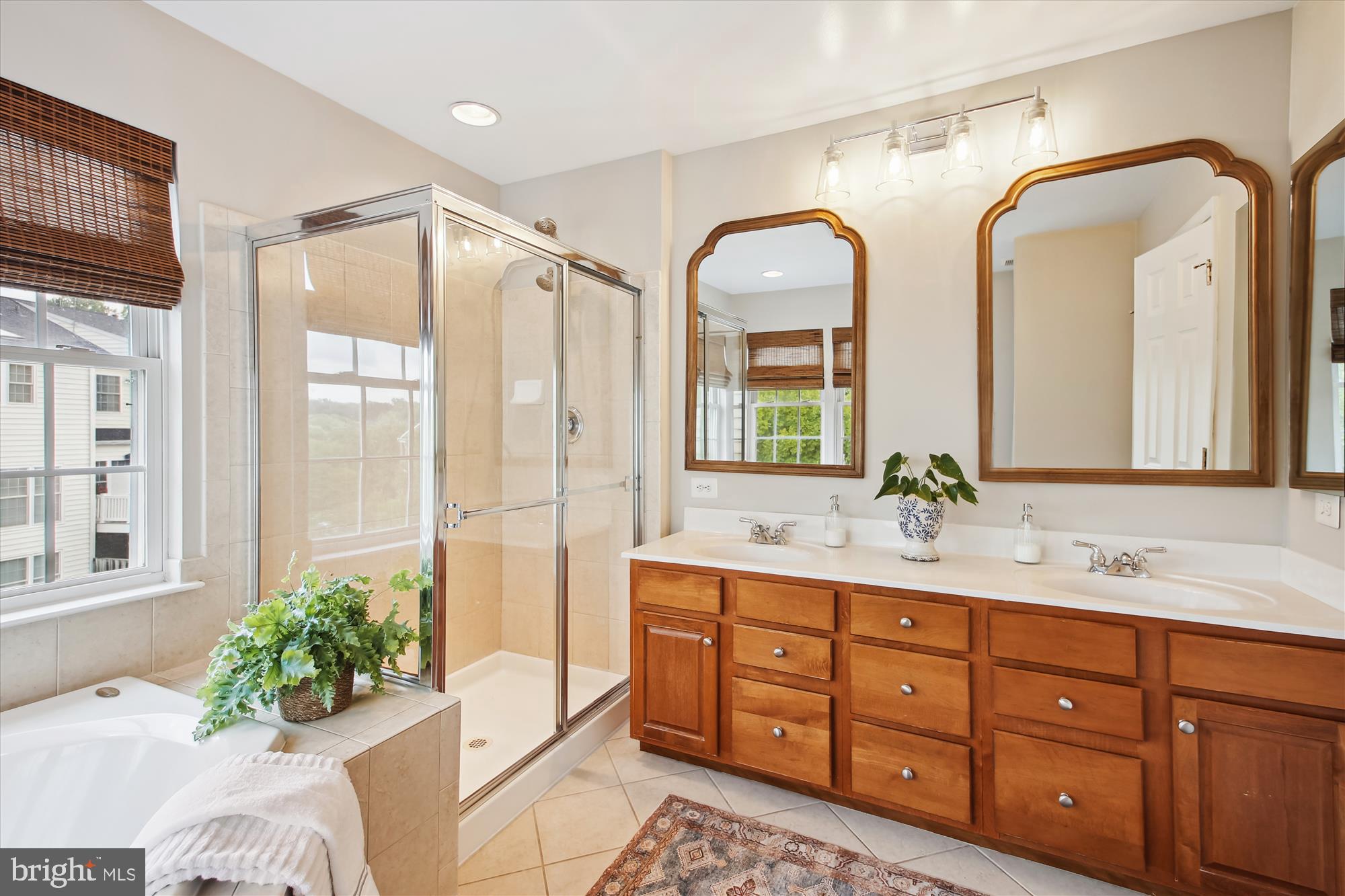 2433 Jostaberry Way Odenton, MD 21113 - Photo 21 of 45 Primary bathroom with shower and soaking tub.