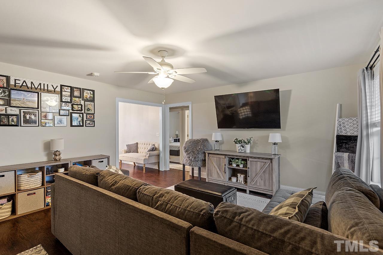 3518 Friday Road Sims, NC 27880 - Photo 11 of 28 a living room with furniture and a flat screen tv