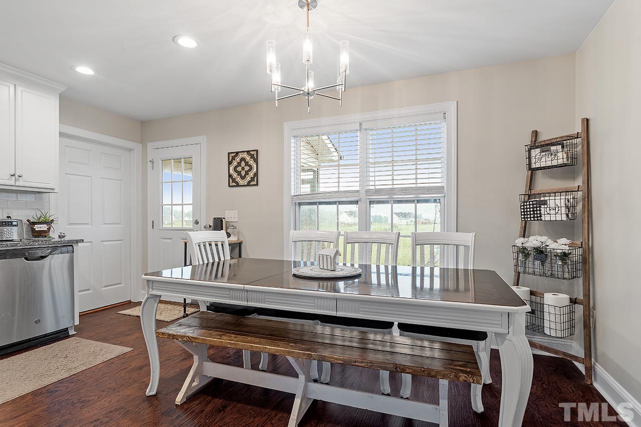 3518 Friday Road Sims, NC 27880 - Photo 17 of 28 a view of a dining room with furniture window and wooden floor