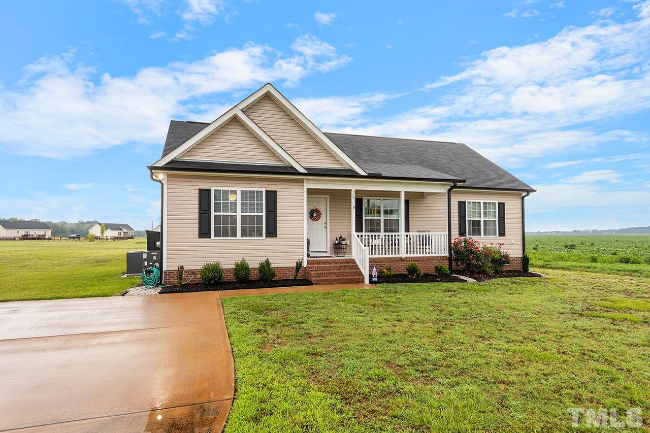 3518 Friday Road Sims, NC 27880 - Photo 3 of 28 a front view of a house with a yard and porch