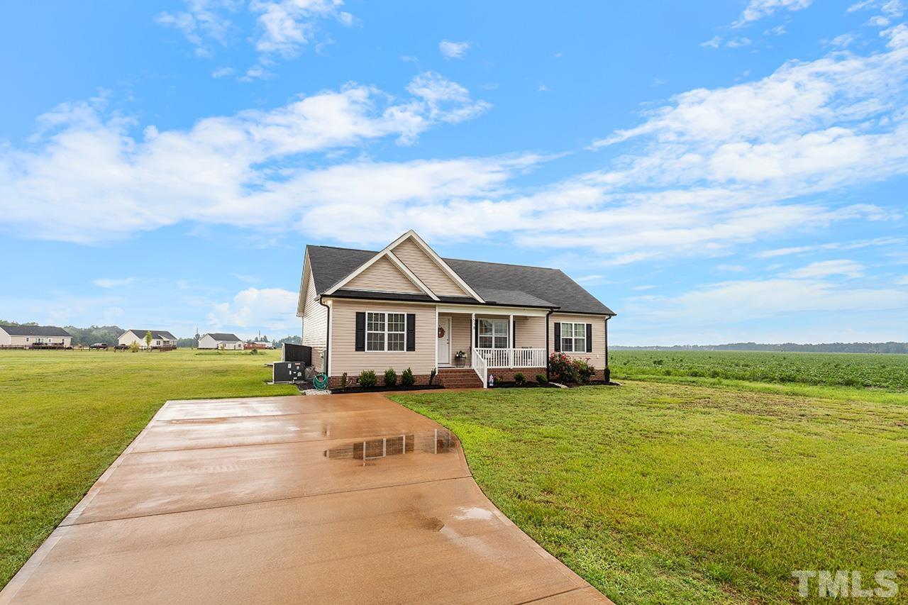 3518 Friday Road Sims, NC 27880 - Photo 4 of 28 a view of house with a garden