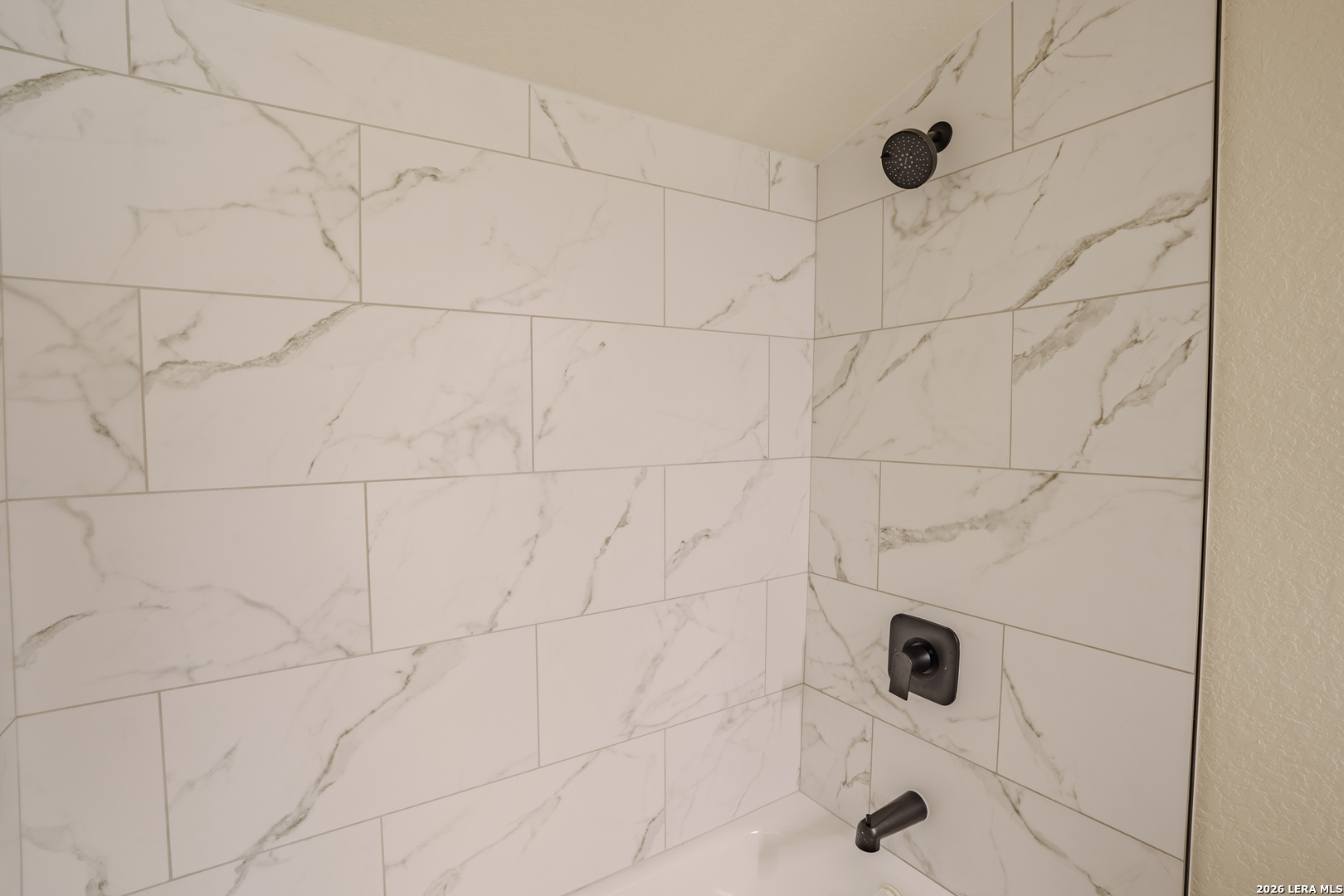 3206 La Rosa Street San Antonio, TX 78211 - Photo 17 of 18 a bathroom with a shower