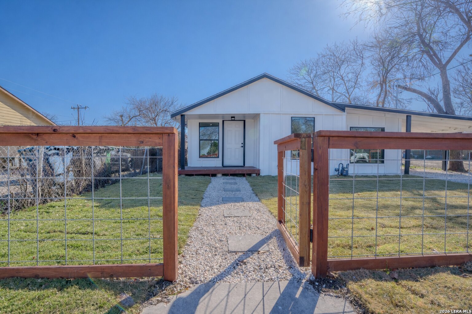 3206 La Rosa Street San Antonio, TX 78211 - Photo 2 of 18 a front view of a house with garden