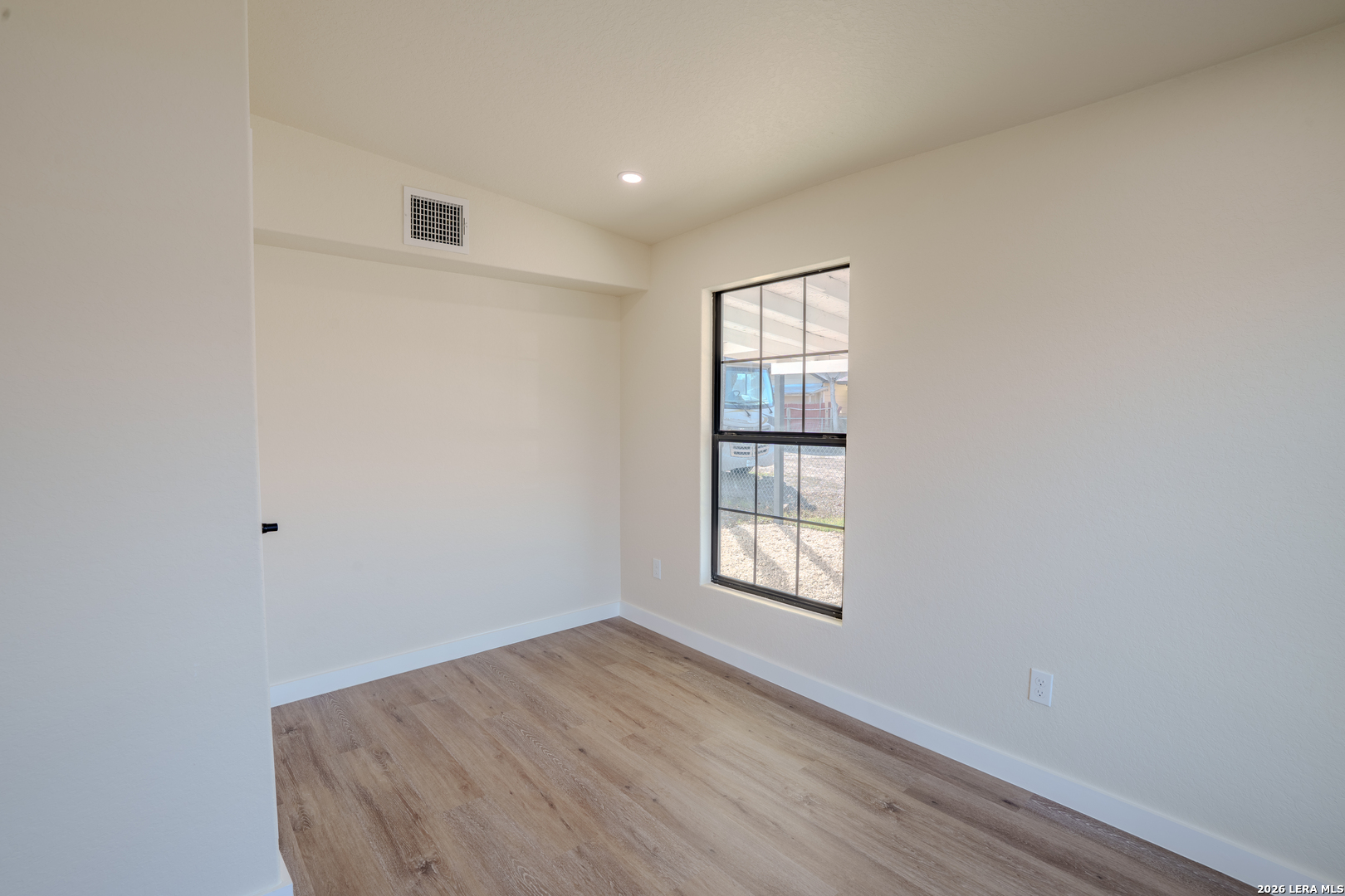 3206 La Rosa Street San Antonio, TX 78211 - Photo 9 of 18 an empty room with windows