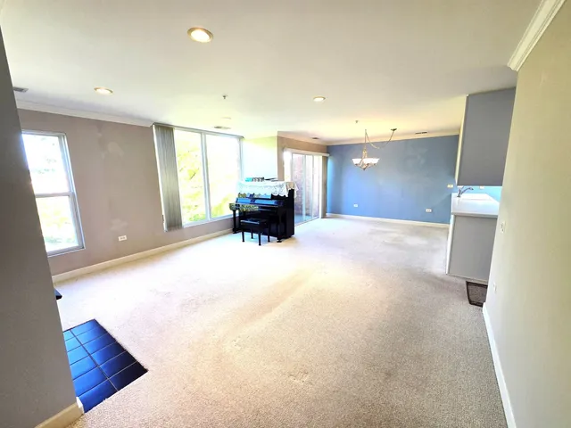 a view of livingroom with furniture and window