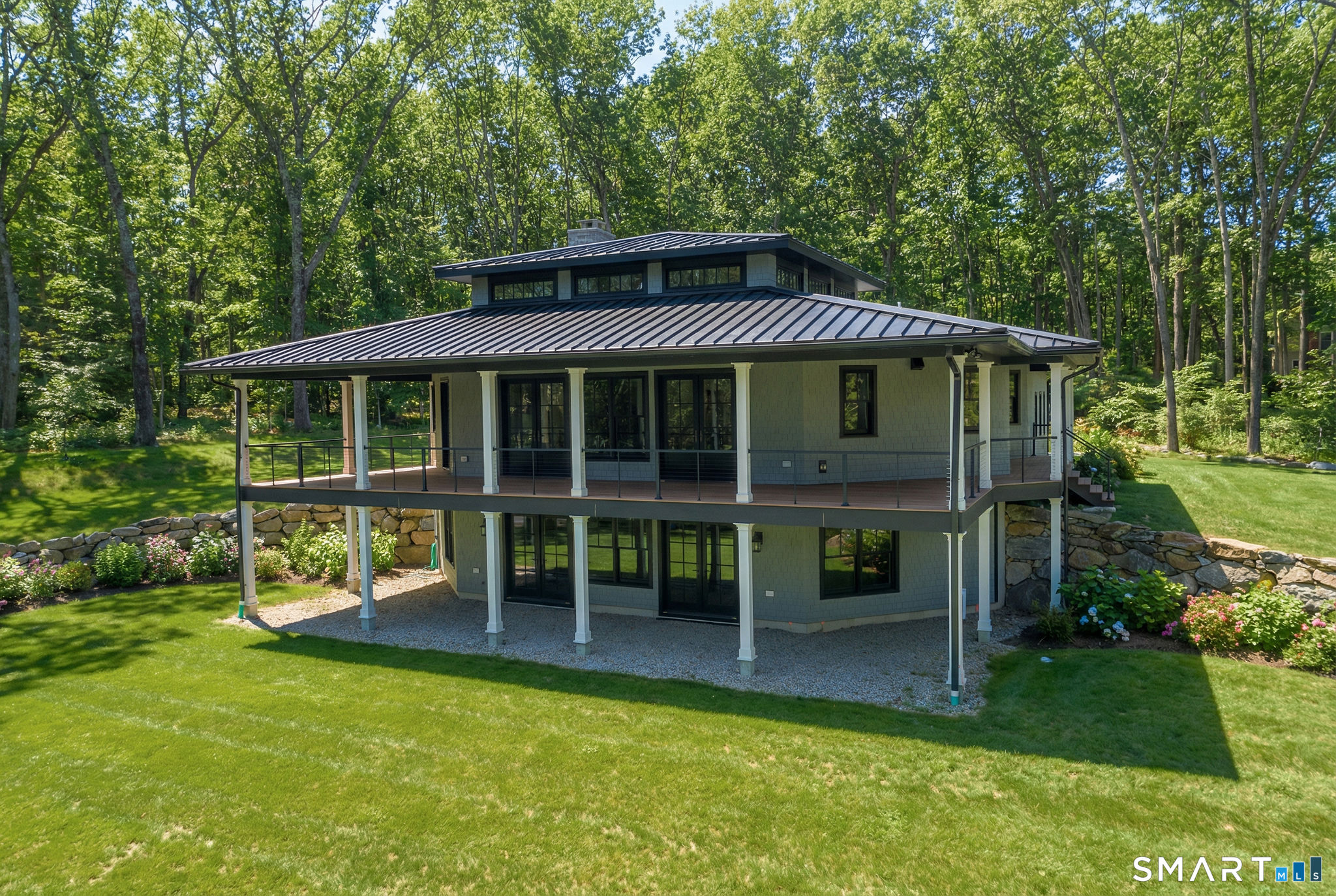 81 Strawberry Hill Road Madison, CT 06443 - Photo 1 of 40 a view of a house with a yard
