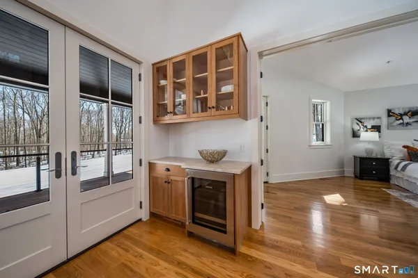 a bed room with a bed and a fireplace