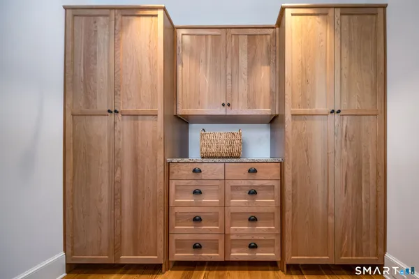 a view of kitchen with wooden floor