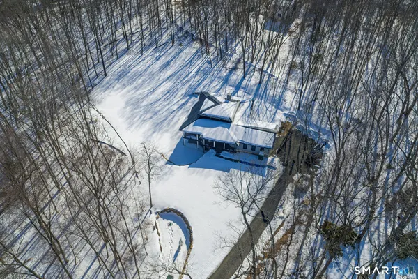 a view of wooden stairs and a yard