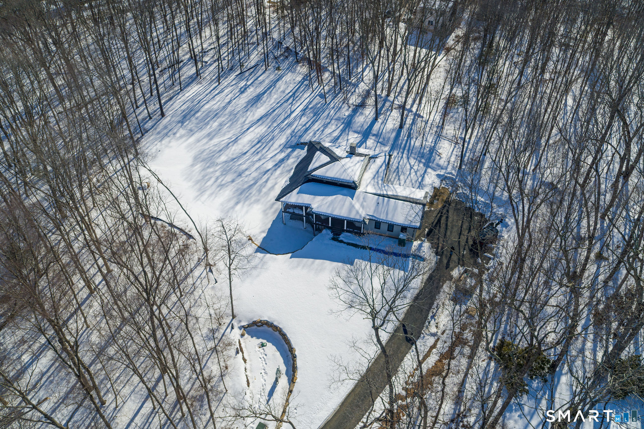 81 Strawberry Hill Road Madison, CT 06443 - Photo 3 of 40 a view of wooden stairs and a yard