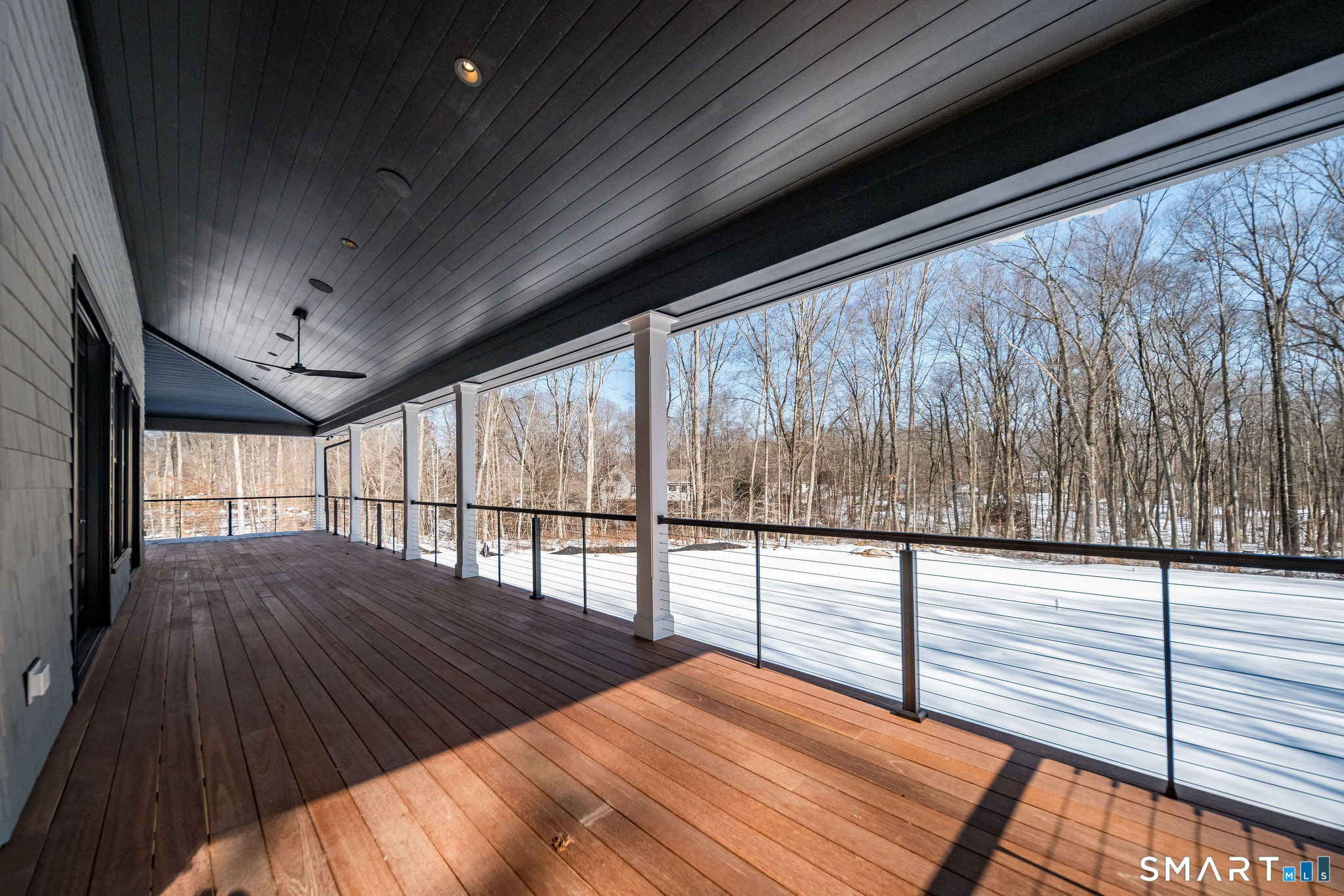 81 Strawberry Hill Road Madison, CT 06443 - Photo 37 of 40 a view of balcony with wooden floor