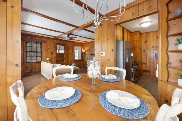 a dining room with furniture and a table