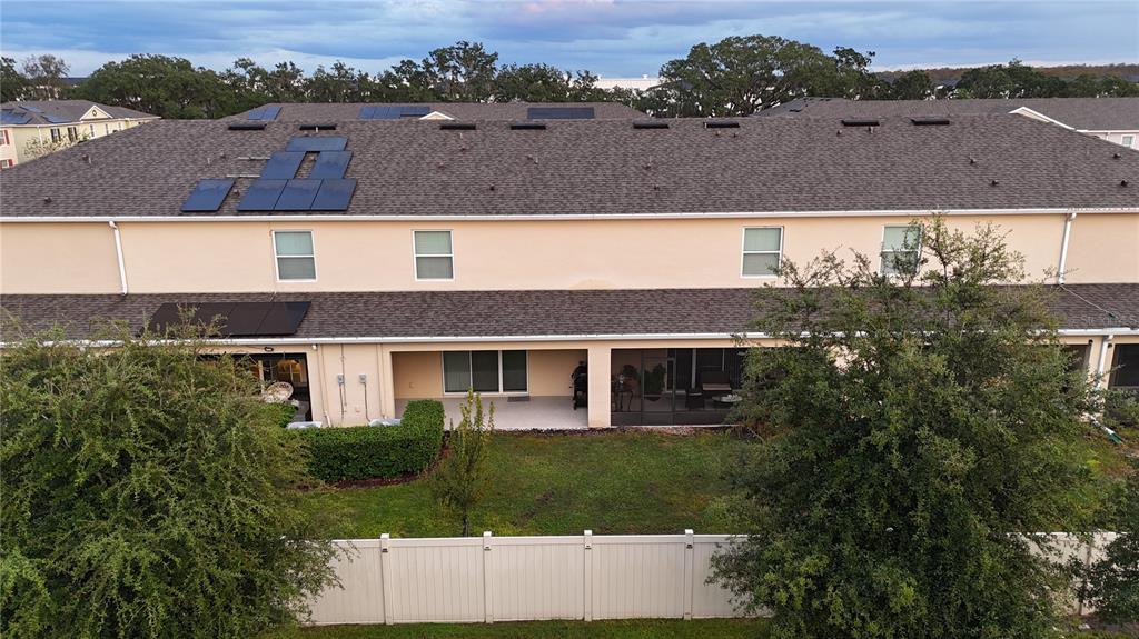 12418 Bowes Branch Road Orlando, FL 32824 - Photo 13 of 21 an aerial view of house with a yard
