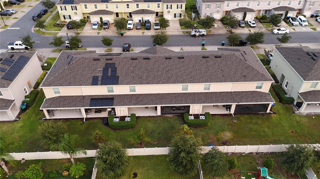 12418 Bowes Branch Road Orlando, FL 32824 - Photo 15 of 21 an aerial view of multiple houses with yard