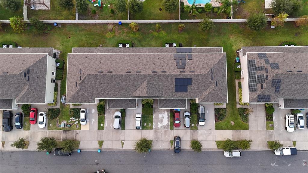 12418 Bowes Branch Road Orlando, FL 32824 - Photo 20 of 21 an aerial view of a house with a lake view