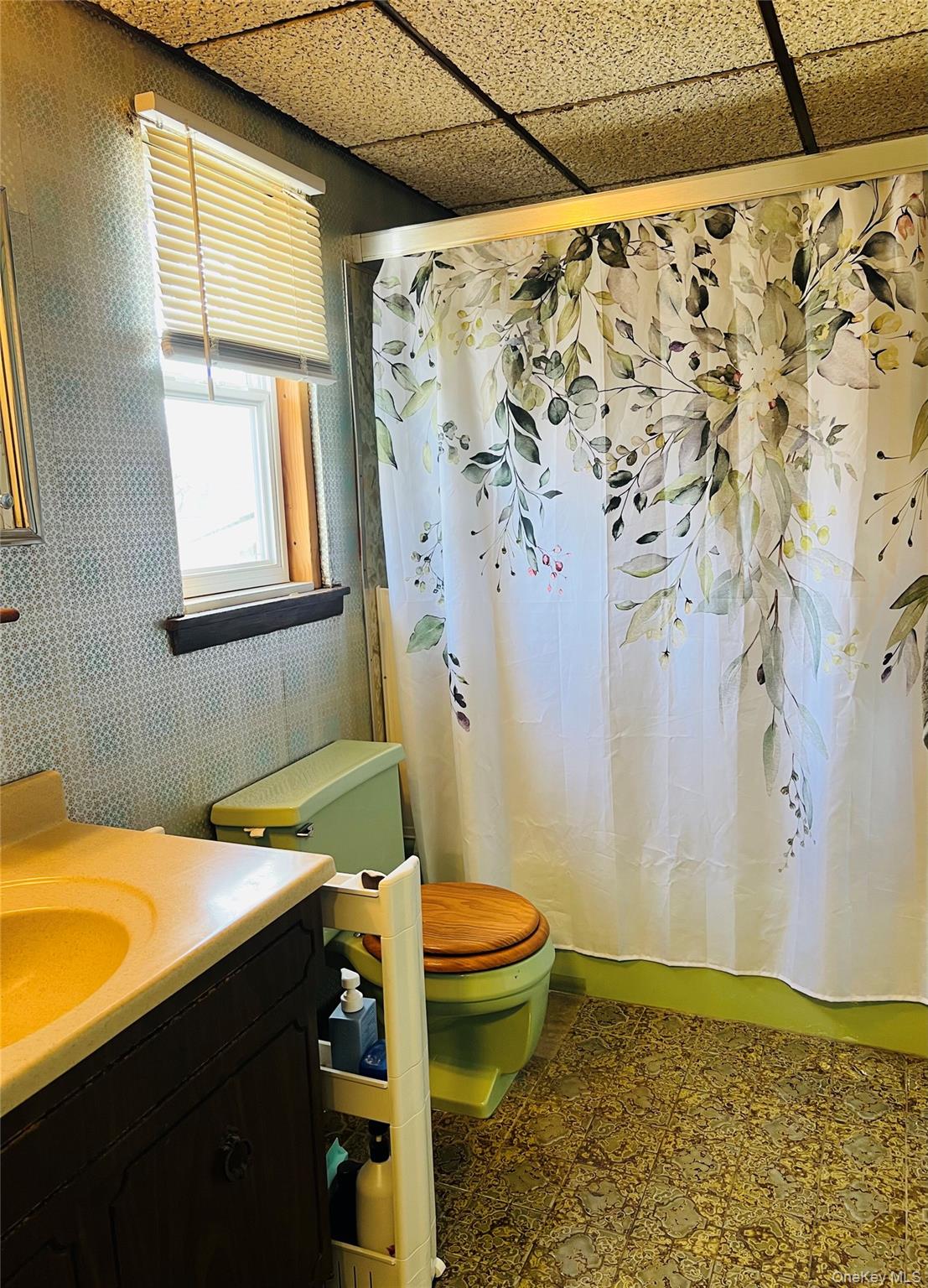 38 Riviera Drive Selden, NY 11784 - Photo 11 of 12 Full Bathroom featuring vanity, shower / bath combo, tile patterned floors