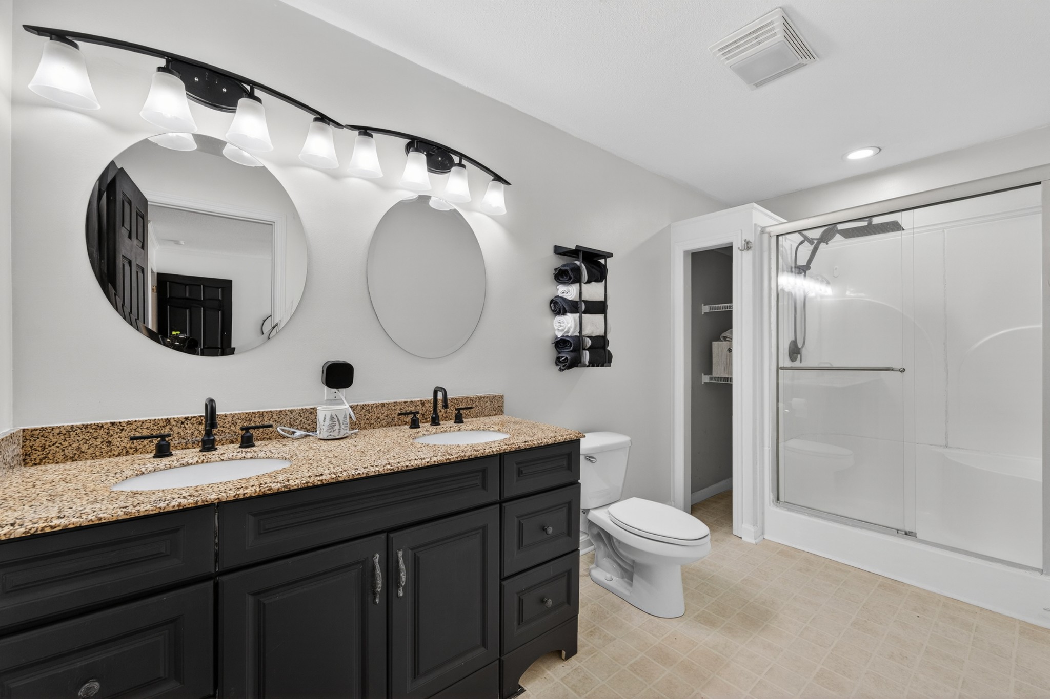 16 Clayton Acres Road Fayetteville, TN 37334 - Photo 12 of 33 a bathroom with a double vanity sink mirror and toilet
