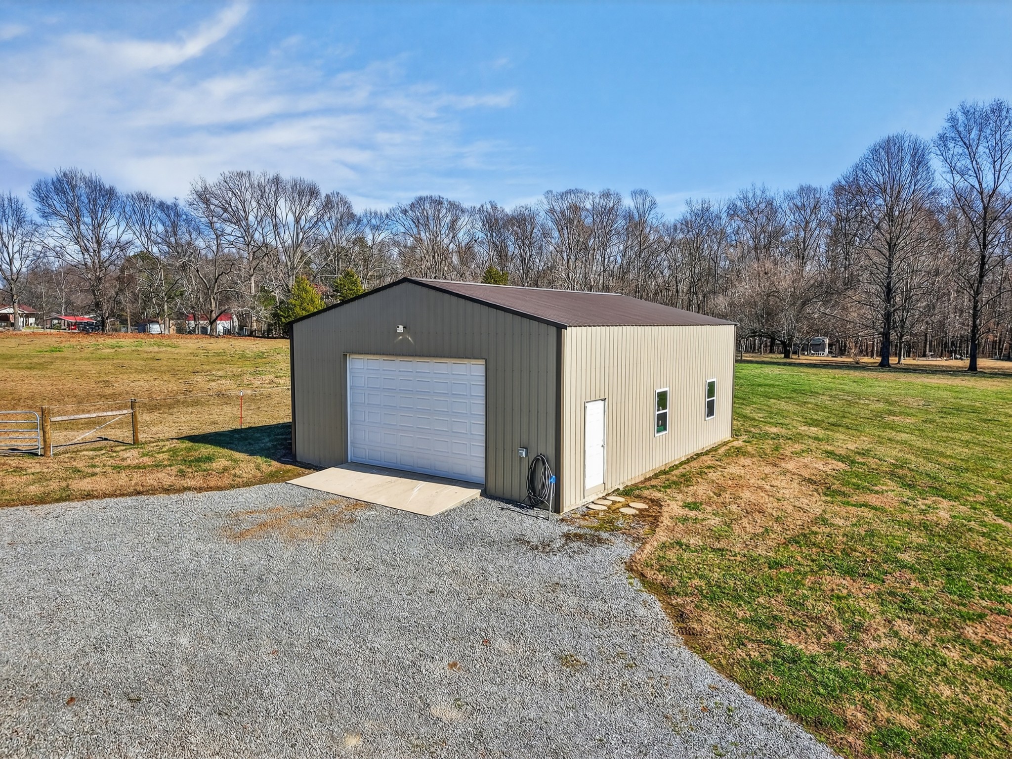 16 Clayton Acres Road Fayetteville, TN 37334 - Photo 25 of 33 a backyard of a house with large trees and a big yard