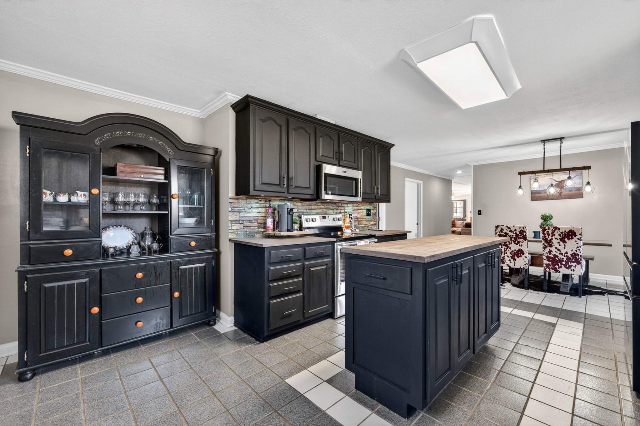 16 Clayton Acres Road Fayetteville, TN 37334 - Photo 9 of 33 a kitchen with stainless steel appliances granite countertop a stove top oven a sink dishwasher and a refrigerator