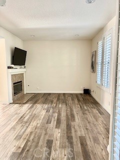 123 Pasto Rico Rancho Santa Margarita, CA 92688 - Photo 4 of 13 a view of a livingroom with an empty space & a window