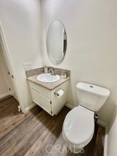 123 Pasto Rico Rancho Santa Margarita, CA 92688 - Photo 8 of 13 a bathroom with a toilet sink and mirror