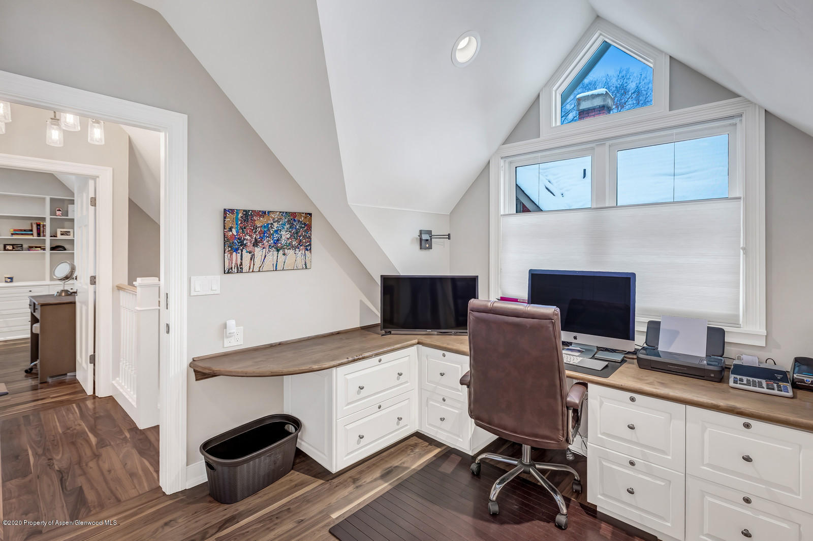 633 West Main Street Aspen, CO 81611 - Photo 12 of 46 a view of workspace with wooden floor and cabinet