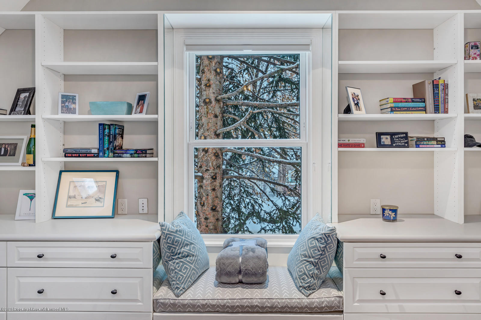 633 West Main Street Aspen, CO 81611 - Photo 16 of 46 a living room with furniture and a window