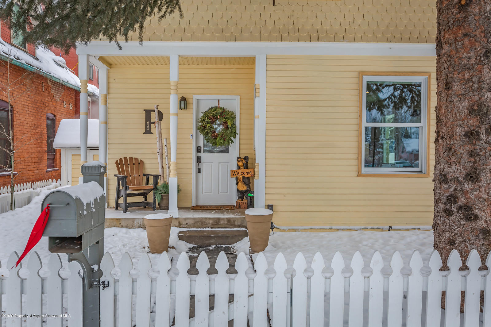 633 West Main Street Aspen, CO 81611 - Photo 22 of 46 a house view with a backyard space
