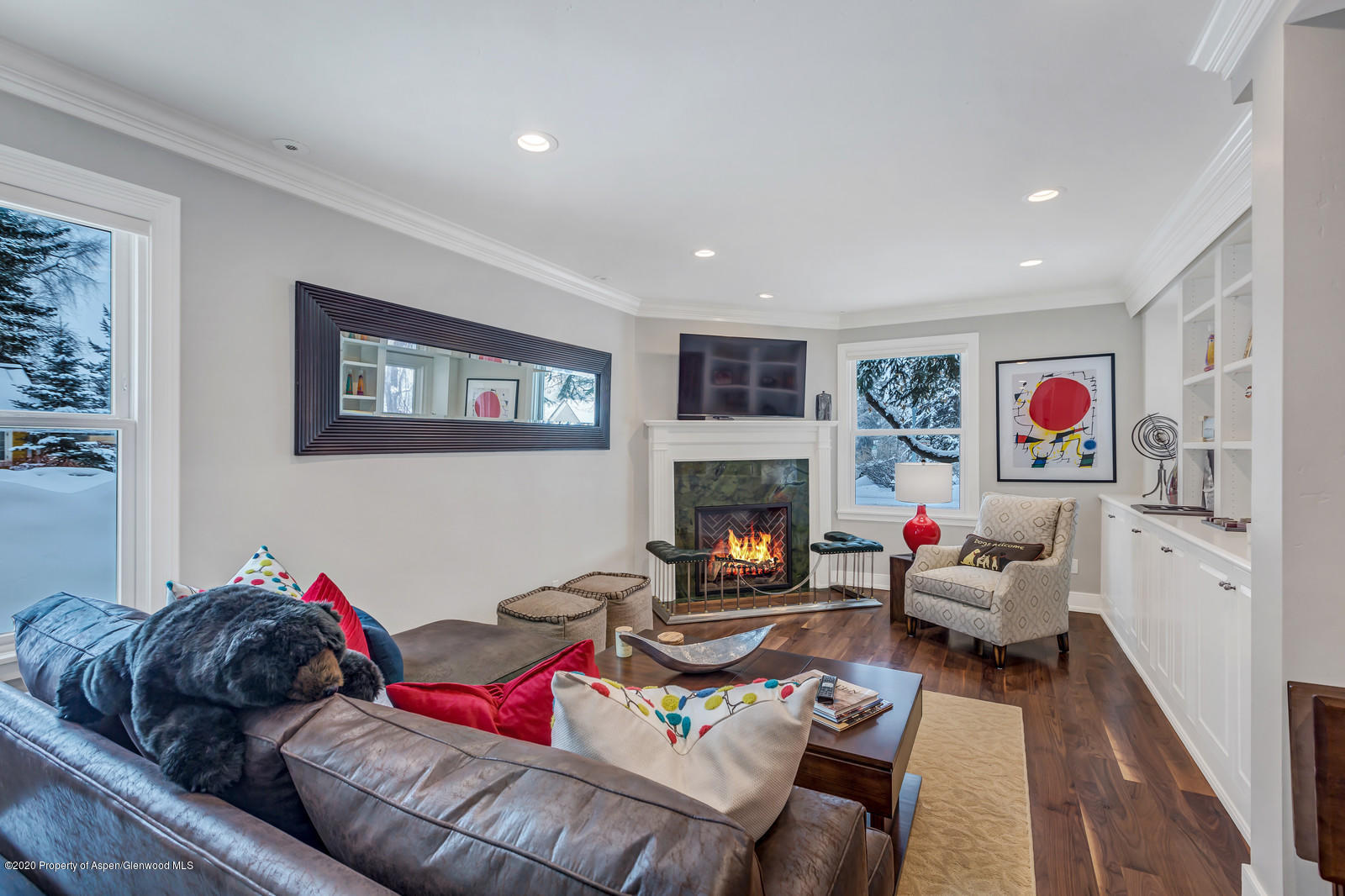 633 West Main Street Aspen, CO 81611 - Photo 25 of 46 a living room with furniture and a fireplace