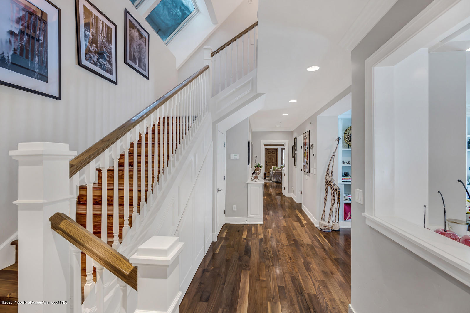 633 West Main Street Aspen, CO 81611 - Photo 30 of 46 a view of entryway with wooden floor and stairs