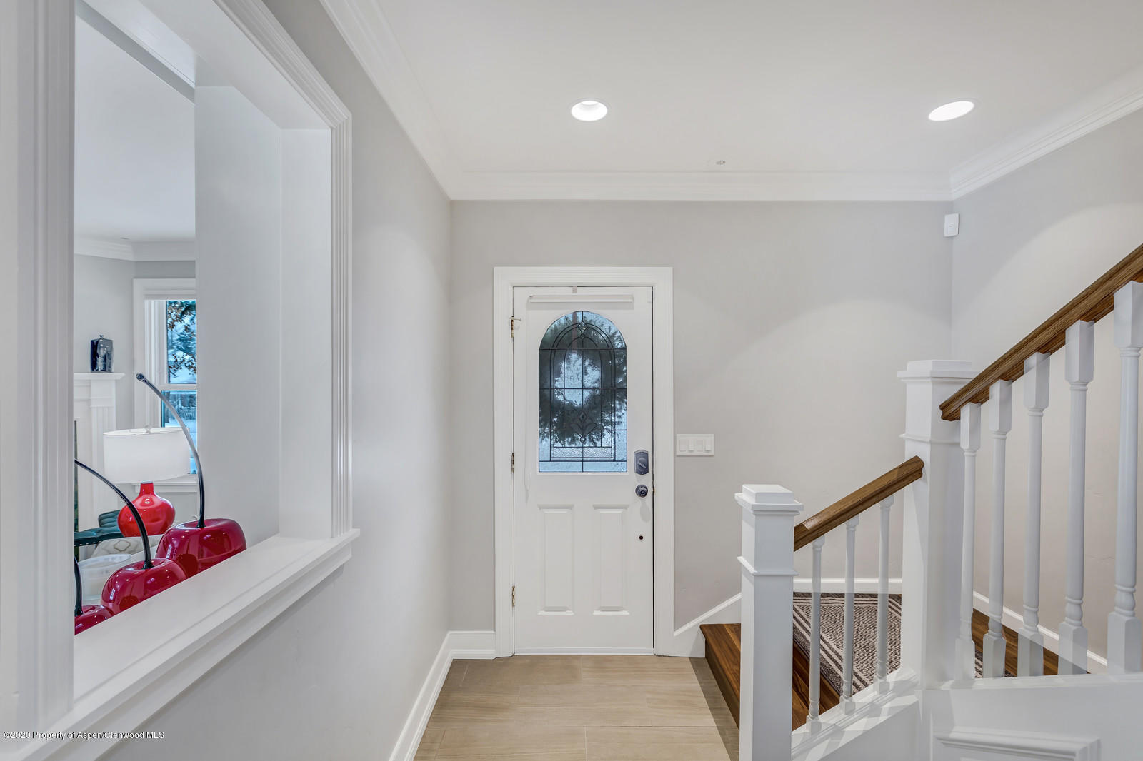 633 West Main Street Aspen, CO 81611 - Photo 33 of 46 a view of a hallway to rooms and stairs