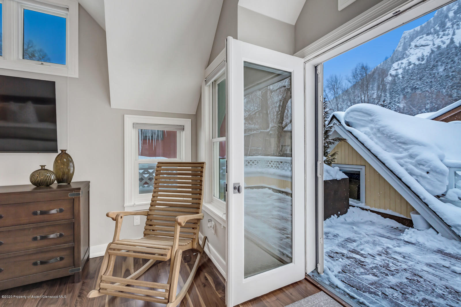 633 West Main Street Aspen, CO 81611 - Photo 4 of 46 a view of a livingroom with furniture and staircase