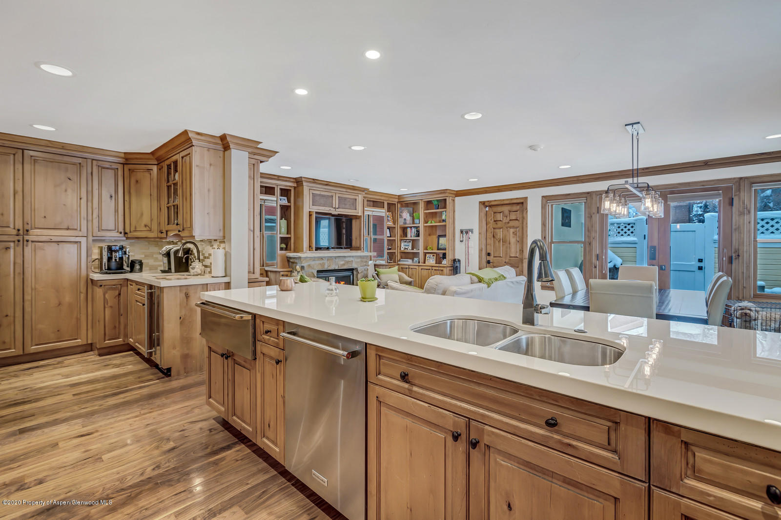 633 West Main Street Aspen, CO 81611 - Photo 43 of 46 a kitchen with sink refrigerator and microwave