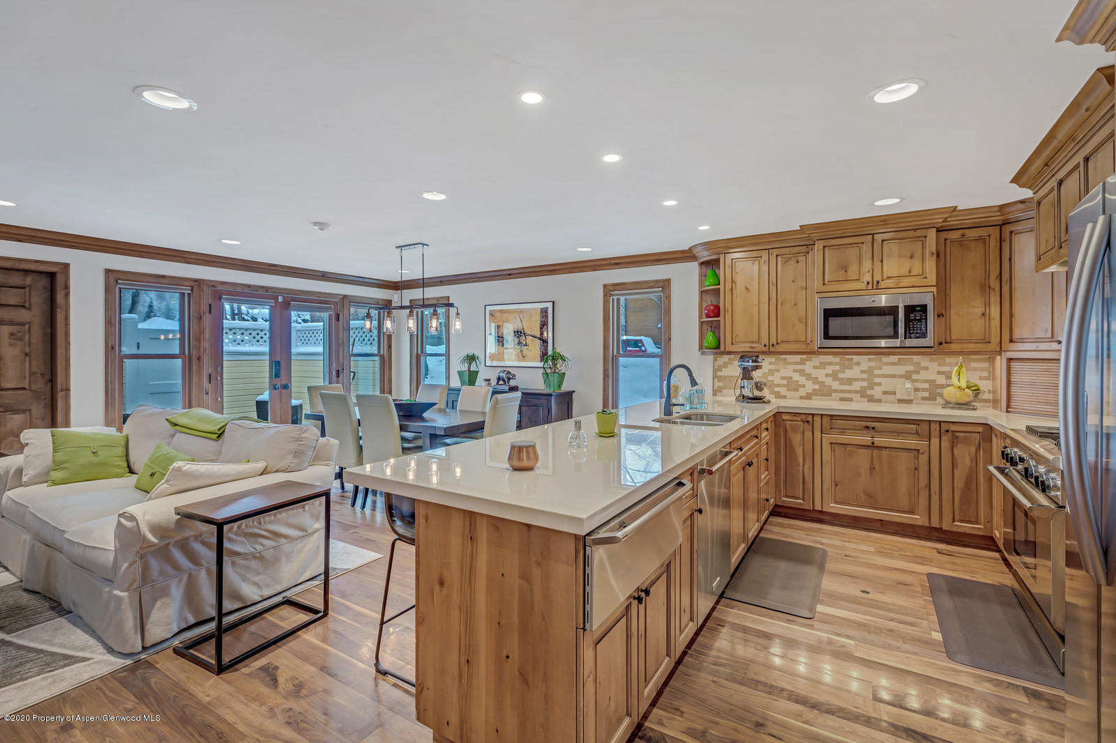 633 West Main Street Aspen, CO 81611 - Photo 45 of 46 a large kitchen with stainless steel appliances granite countertop a lot of counter space and a sink