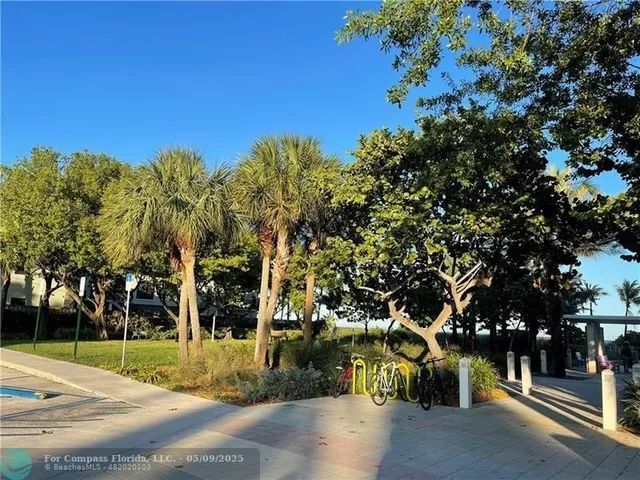 a view of street along with trees