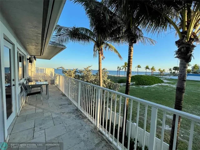 a view of a porch with garden