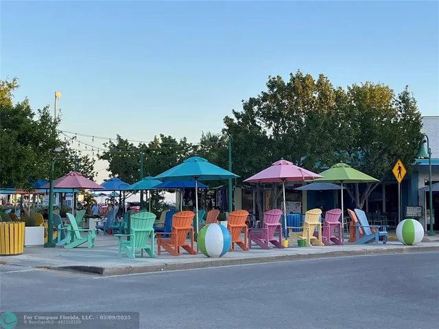 a area with lots of trees in front of it