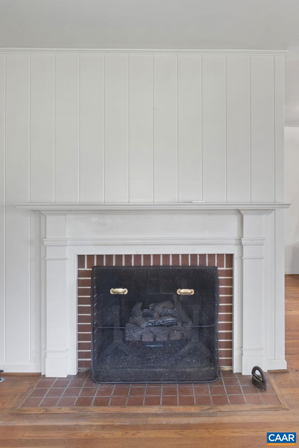9281 Dick Woods Road Afton, VA 22920 - Photo 14 of 29 a closeup of white cabinet and a fireplace