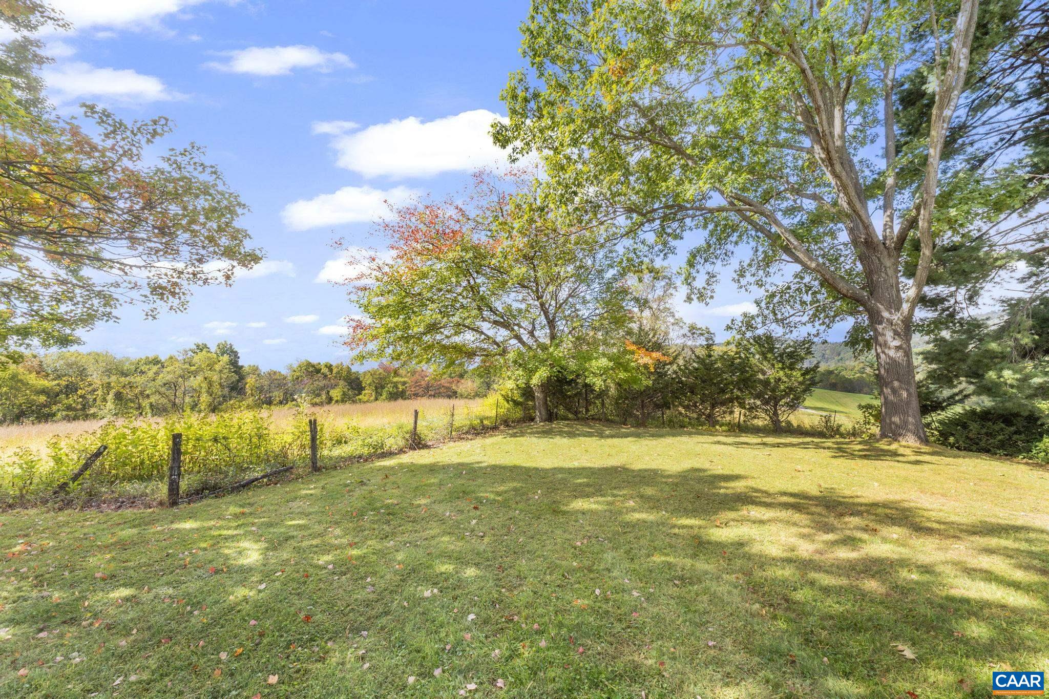 9281 Dick Woods Road Afton, VA 22920 - Photo 3 of 29 a view of yard with swimming pool and trees