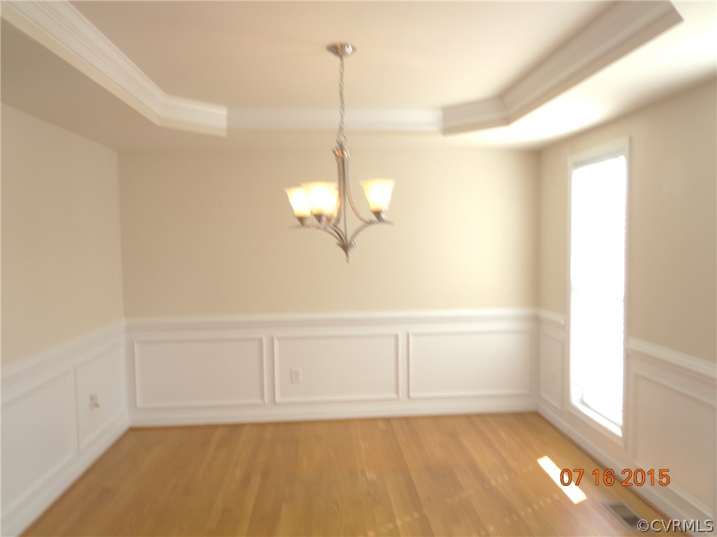 5700 Garden Ridge Road Chesterfield, VA 23832 - Photo 4 of 18 a view of a room with wooden floor and white walls