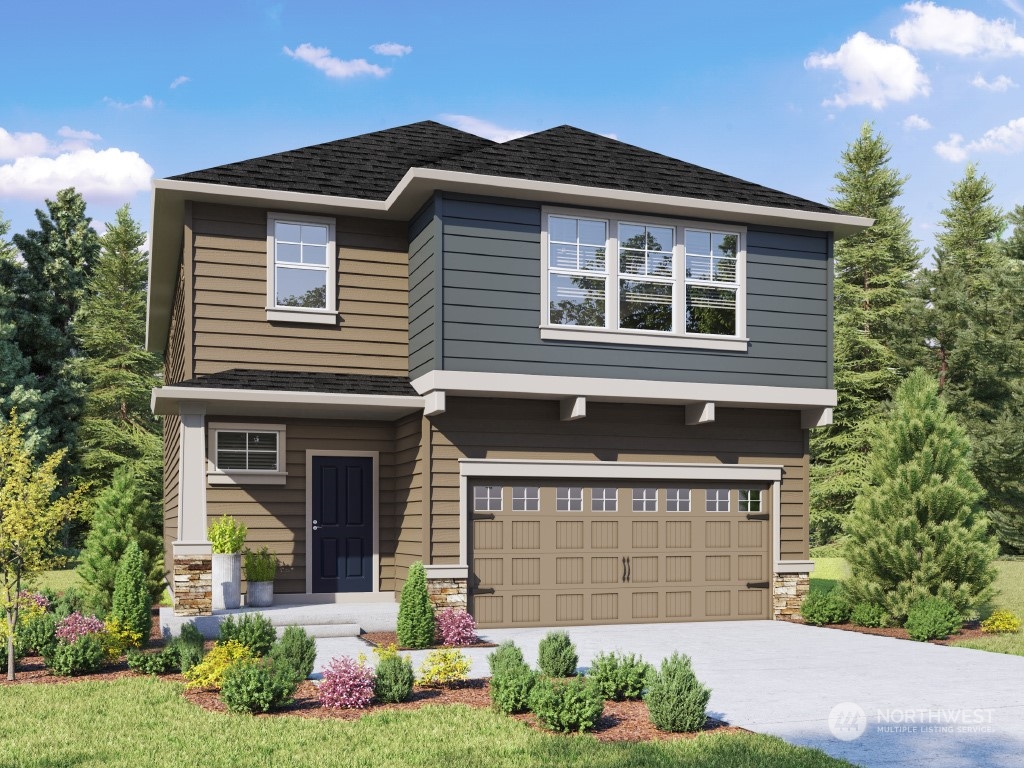 2810 194th Place Southeast, Unit F18 Bothell, WA 98012 - Photo 1 of 2 a front view of a house with garden