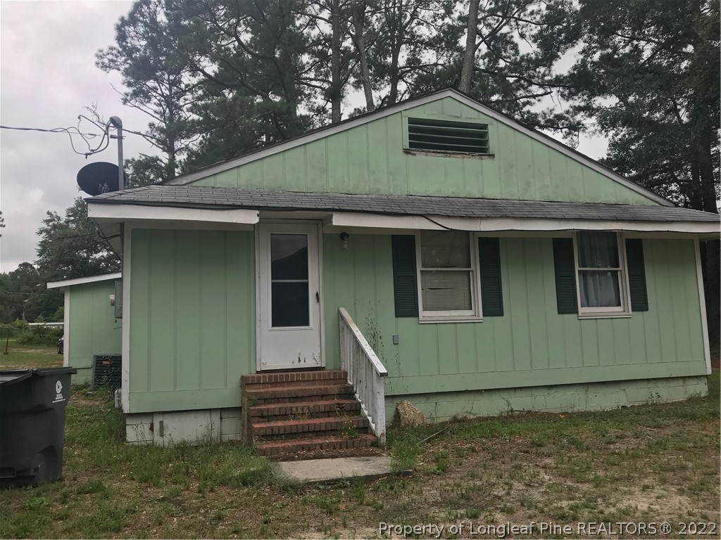 580 West Manchester Road Spring Lake, NC 28390 - Photo 20 of 33 a view of a house with a yard