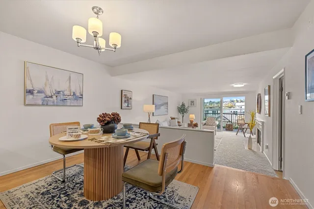 a bedroom with a bed a table and chair