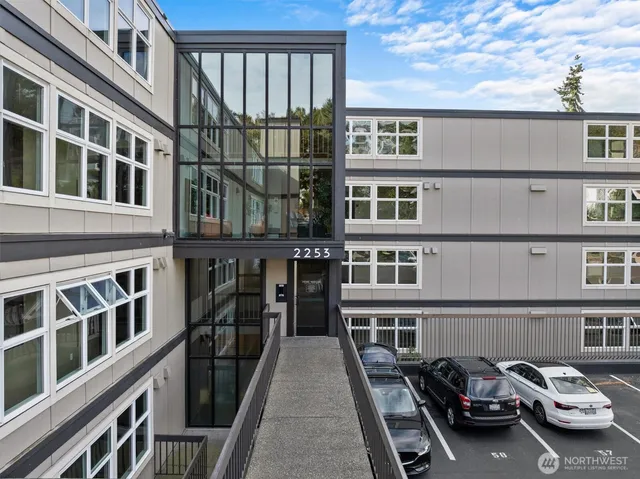 a front view of a building with glass windows