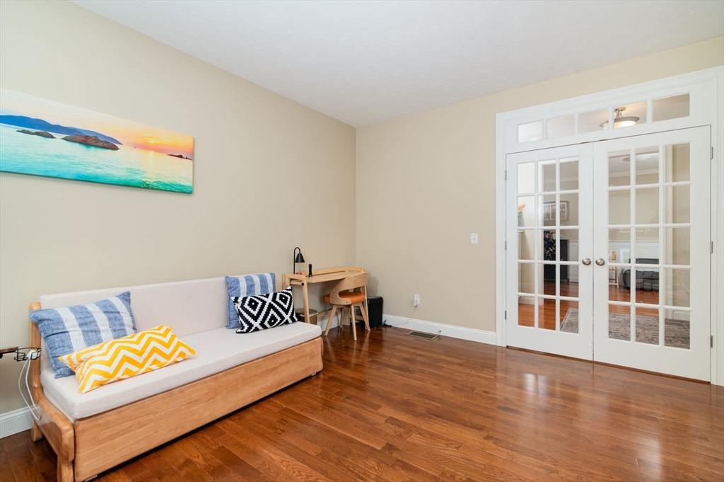 51 Tamarack Road Dracut, MA 01826 - Photo 5 of 39 a living room with furniture and a large window