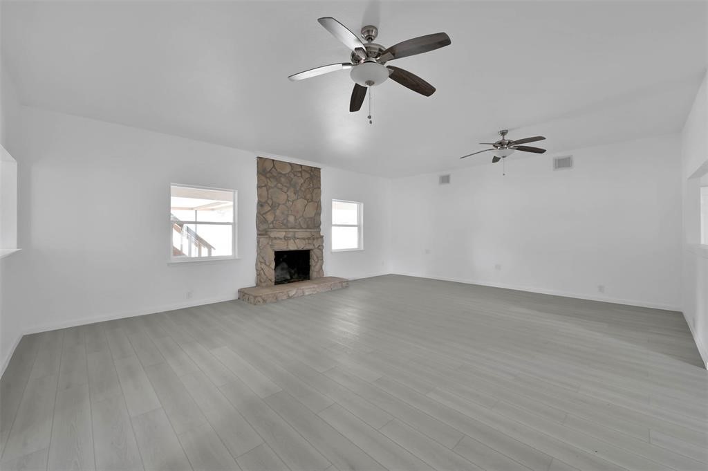 549 Brandon Road Conroe, TX 77302 - Photo 3 of 19 The cozy fireplace adorns the livingroom